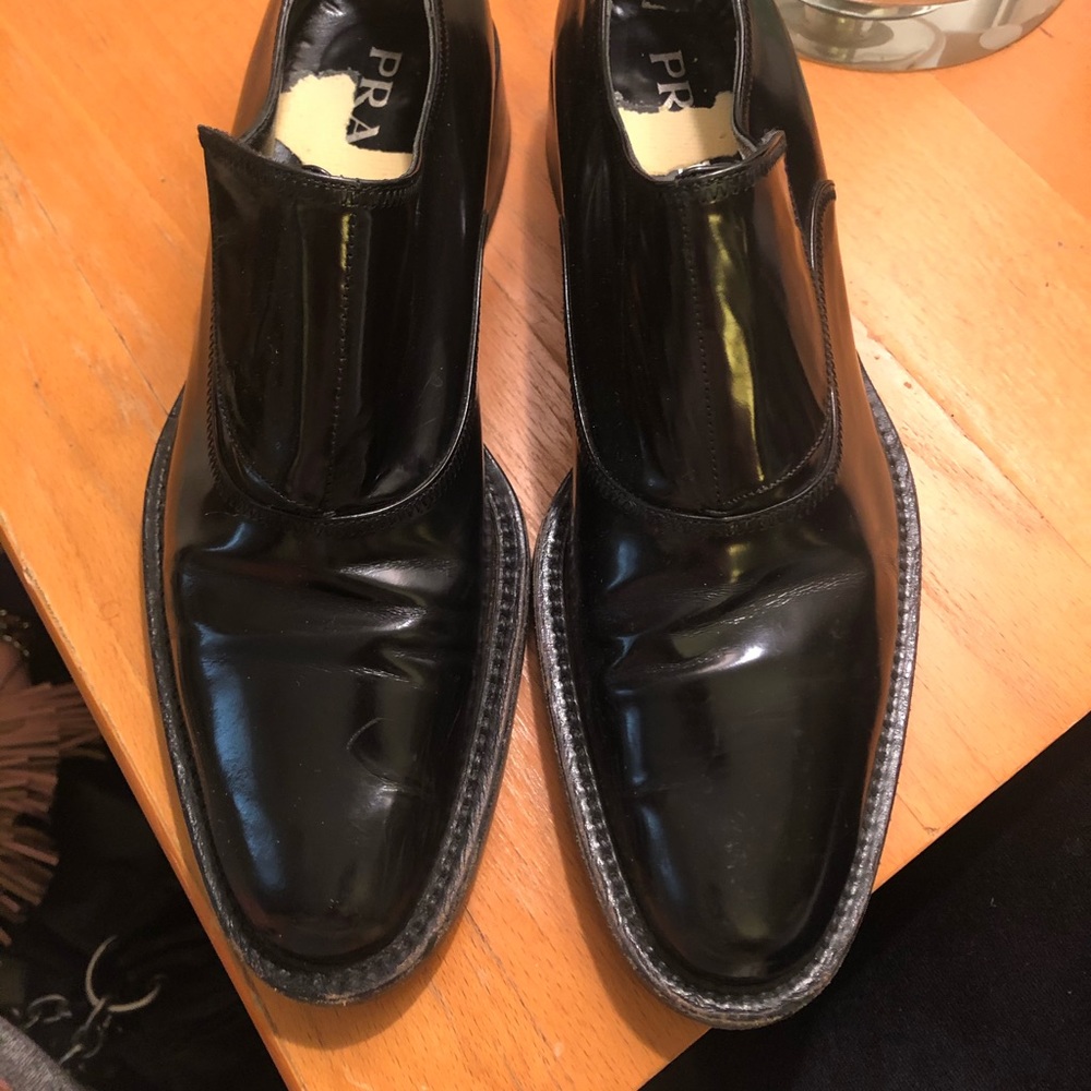 Black patent leather Prada loafers